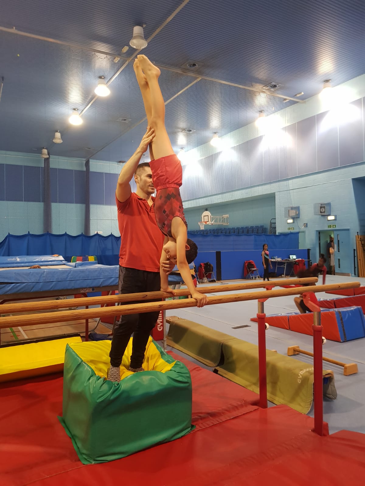 Teaching artistic gymnastics at the Elite Gymnastics Academy CIC, London