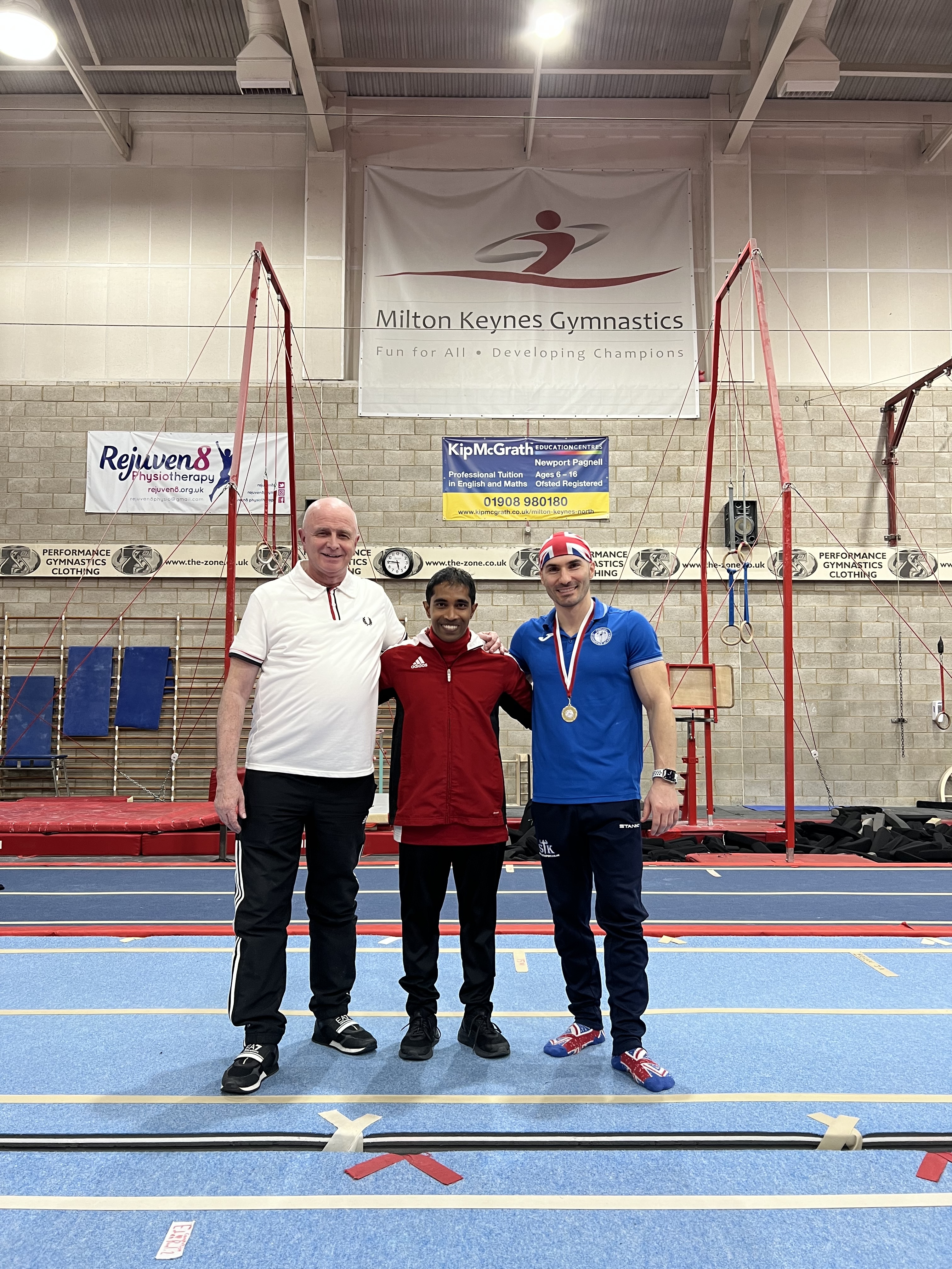 coach Stefan Kolimechkov, Our Welfare Officer Maurice and gymnast Prashanth Sellathurai at the 2023 Milton Keynes Adult Competition