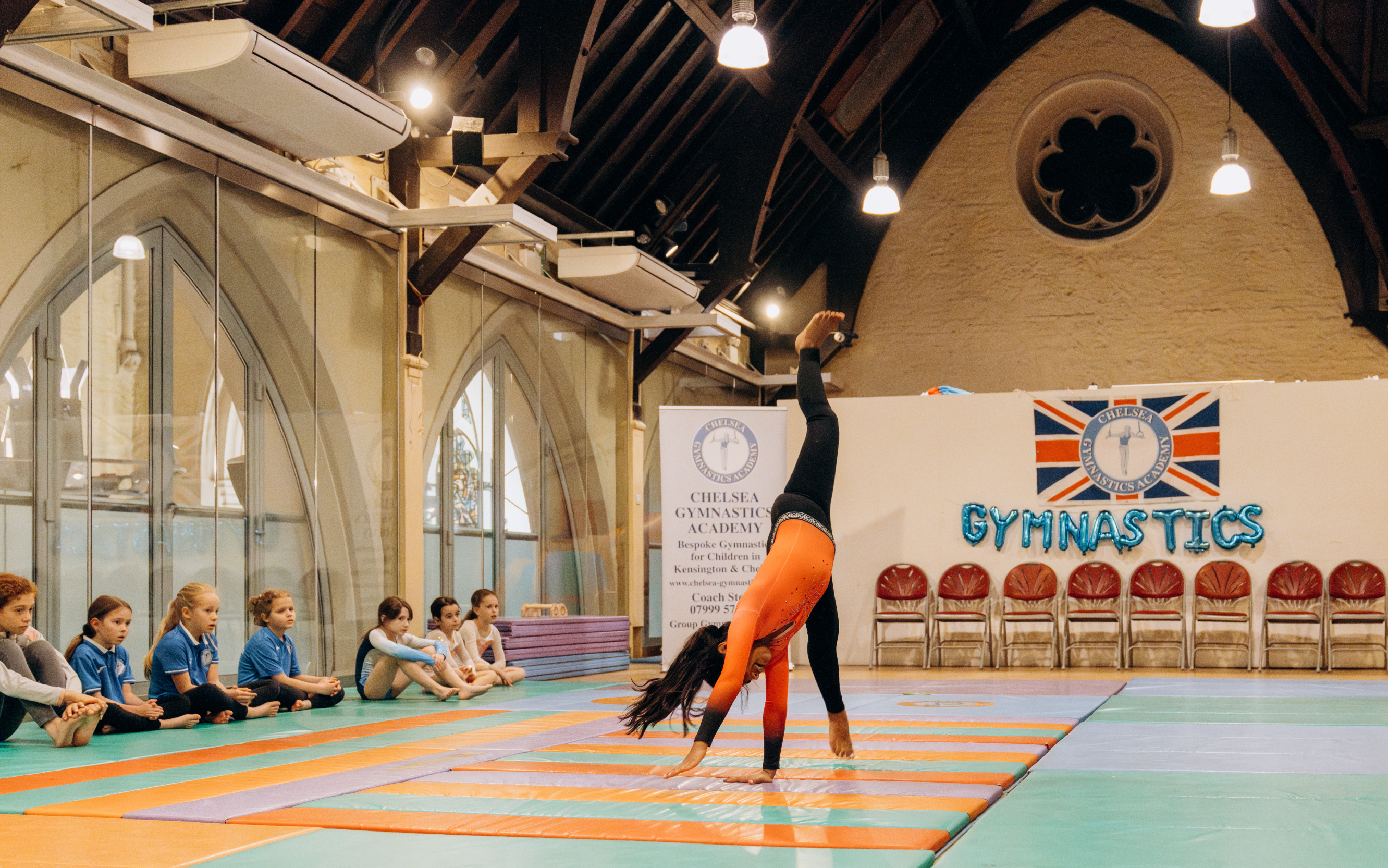 Children practise Cartwheel at Chelsea Gymnastics Academy in London